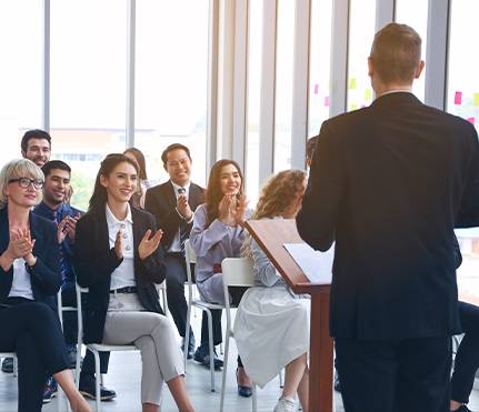 a group of people attending conference